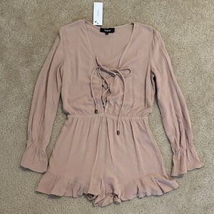 Aakaa Lace-Up Long Sleeve Romper in Blush